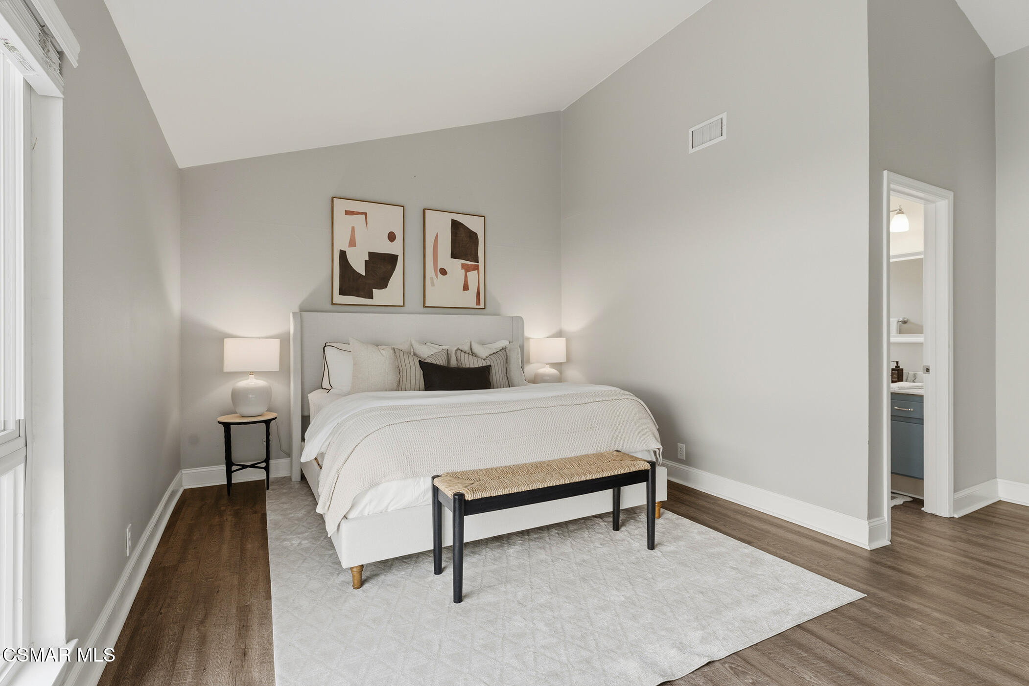 1860 Wychoff Avenue Simi Valley, CA 93063 - Photo 20 of 47 a bedroom with a bed and wooden floor
