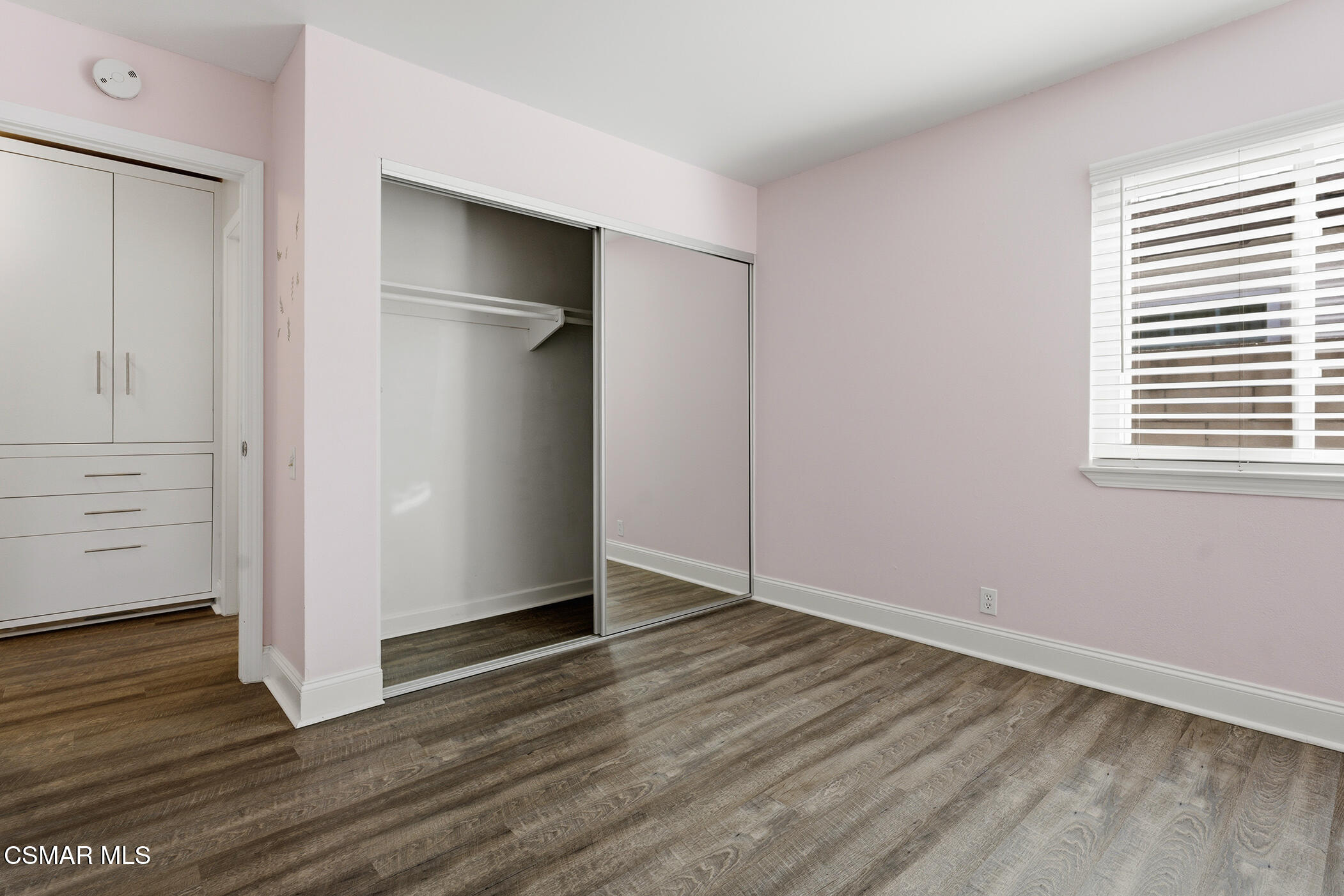 1860 Wychoff Avenue Simi Valley, CA 93063 - Photo 28 of 47 an empty room with wooden floor closet and windows