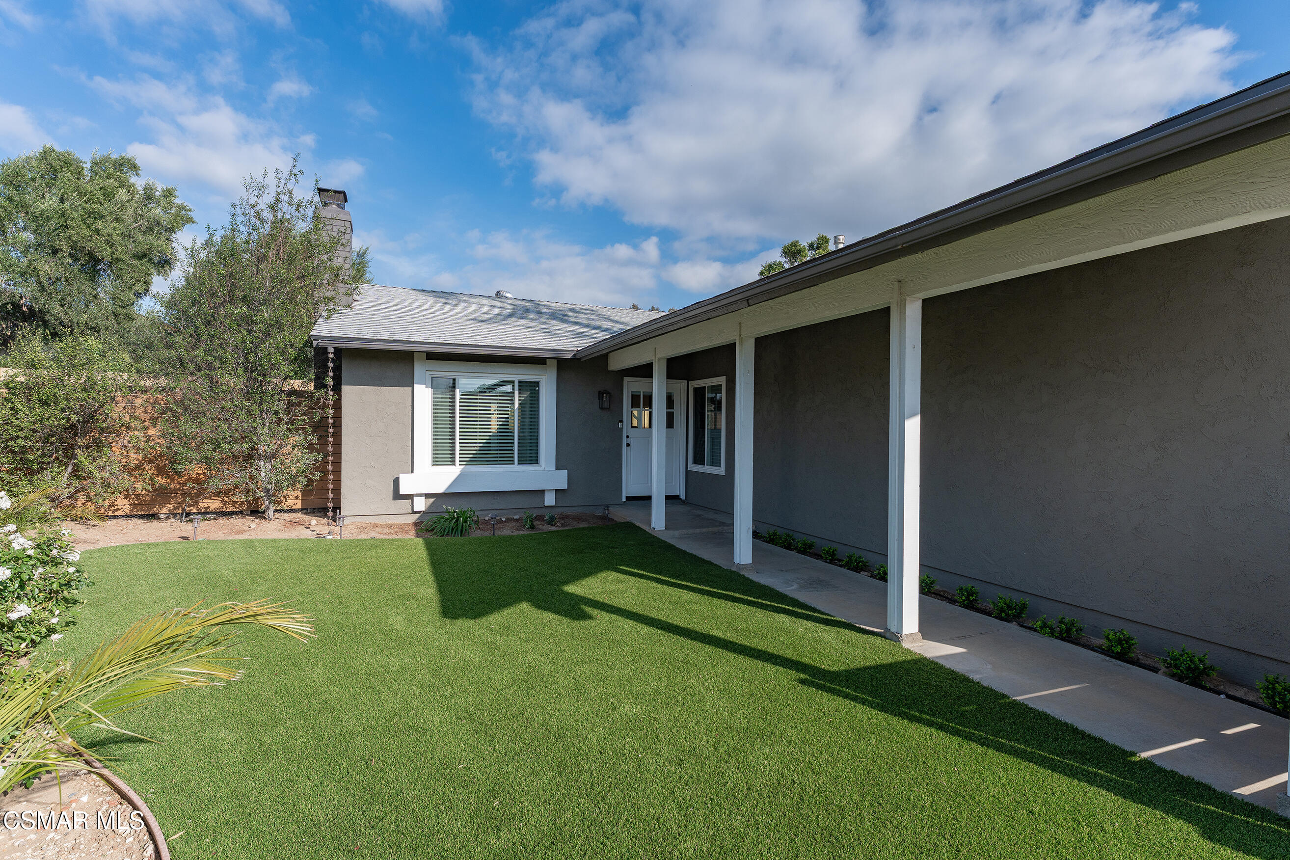 1860 Wychoff Avenue Simi Valley, CA 93063 - Photo 3 of 47 a view of a house with backyard and porch