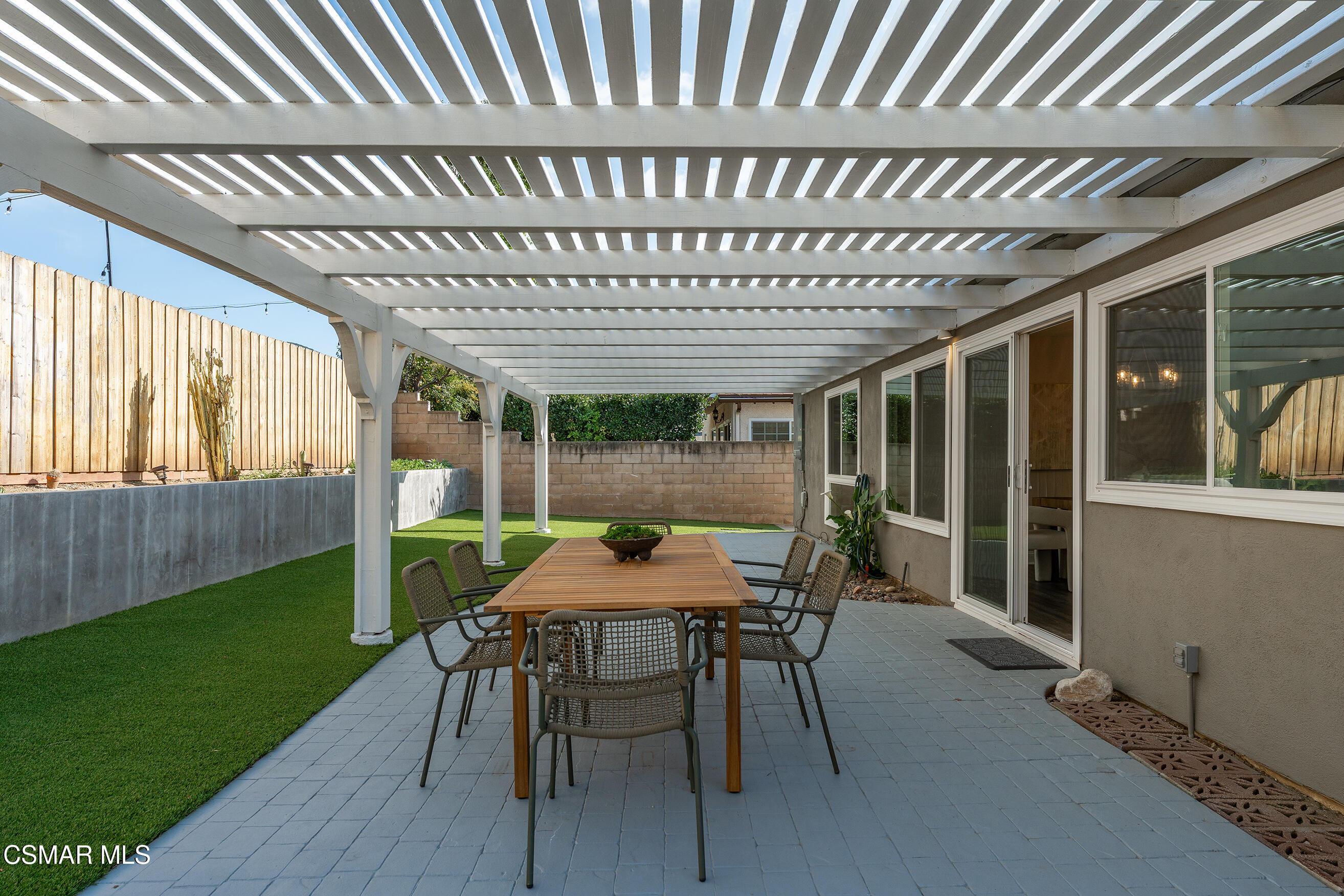1860 Wychoff Avenue Simi Valley, CA 93063 - Photo 32 of 47 a patio with table and chairs