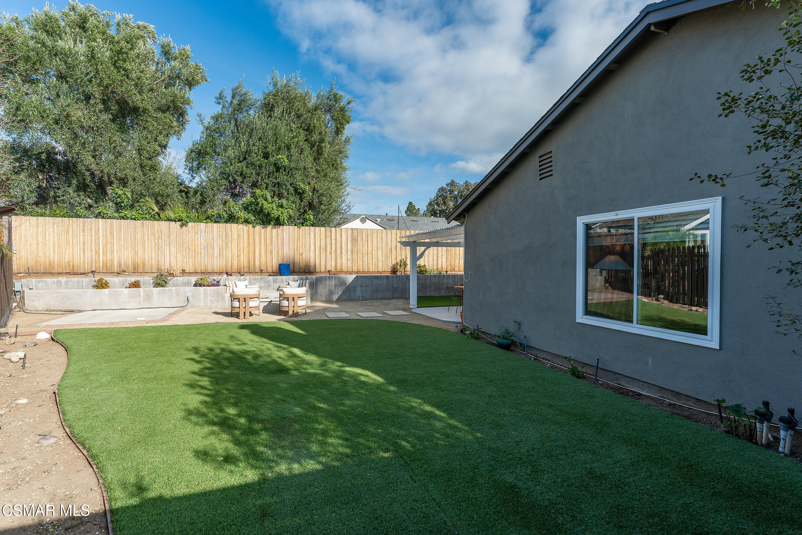 1860 Wychoff Avenue Simi Valley, CA 93063 - Photo 40 of 47 a view of backyard with outdoor seating and green space
