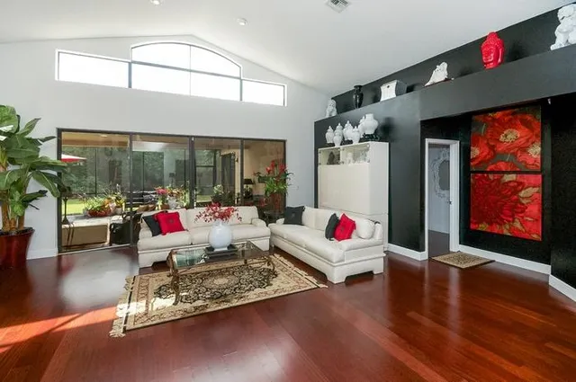 a living room with furniture and window
