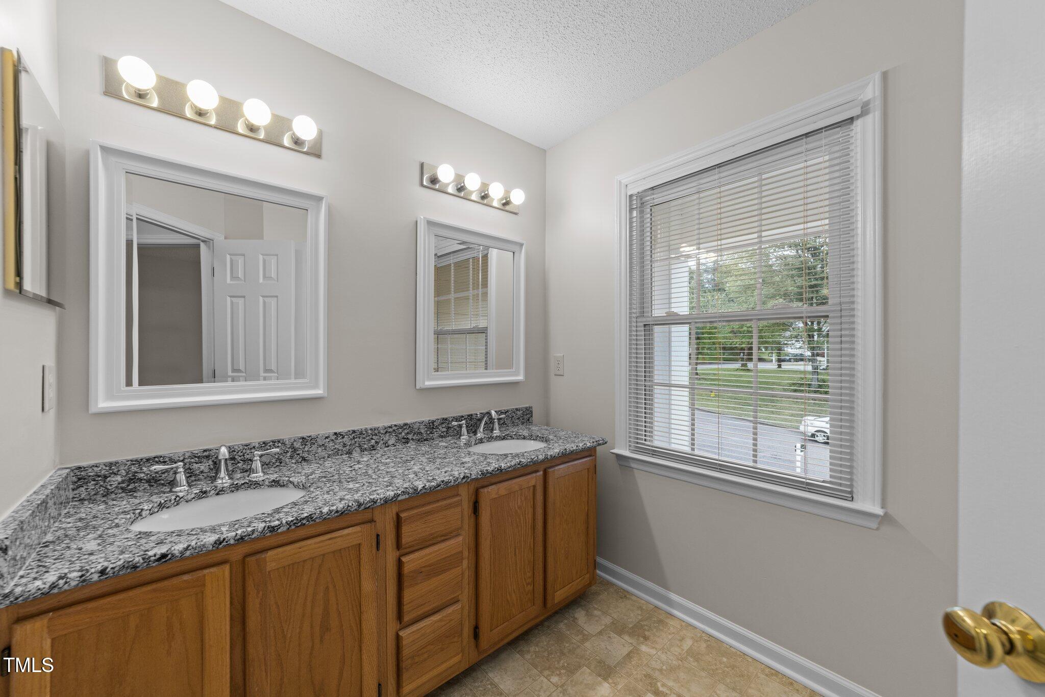 12325 Amoretto Way Raleigh, NC 27613 - Photo 25 of 43 Hall Bathroom