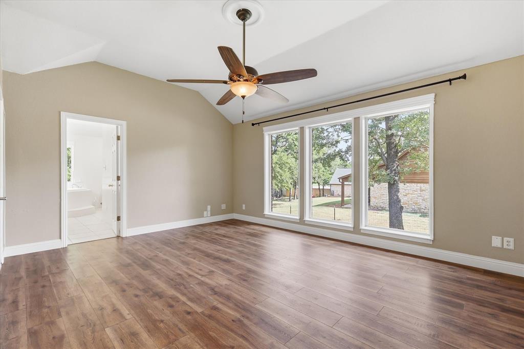 289 County Road 1170 Decatur, TX 76234 - Photo 18 of 40 Oversized Primary bedroom with NEW PICTURE WINDOWS!