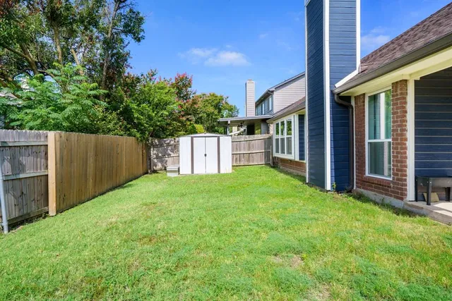 a house view with a garden space