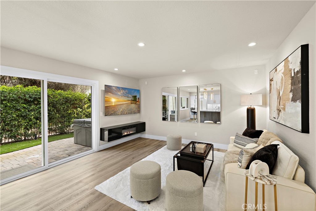 23277 Atlantis Way Dana Point, CA 92629 - Photo 19 of 48 a living room with furniture and a flat screen tv