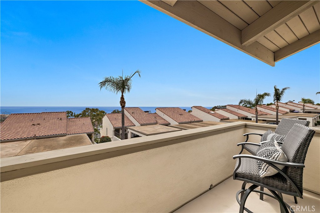 23277 Atlantis Way Dana Point, CA 92629 - Photo 37 of 48 a view of a dining room with furniture and a potted plant