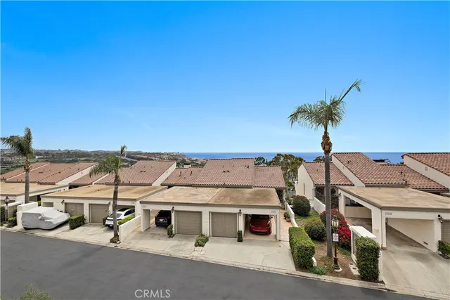 a view of roof deck with a flat screen tv and yard