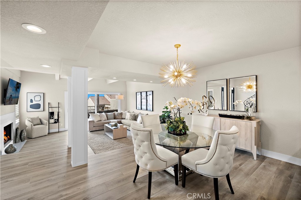 23277 Atlantis Way Dana Point, CA 92629 - Photo 8 of 48 a view of a dining room with furniture and wooden floor