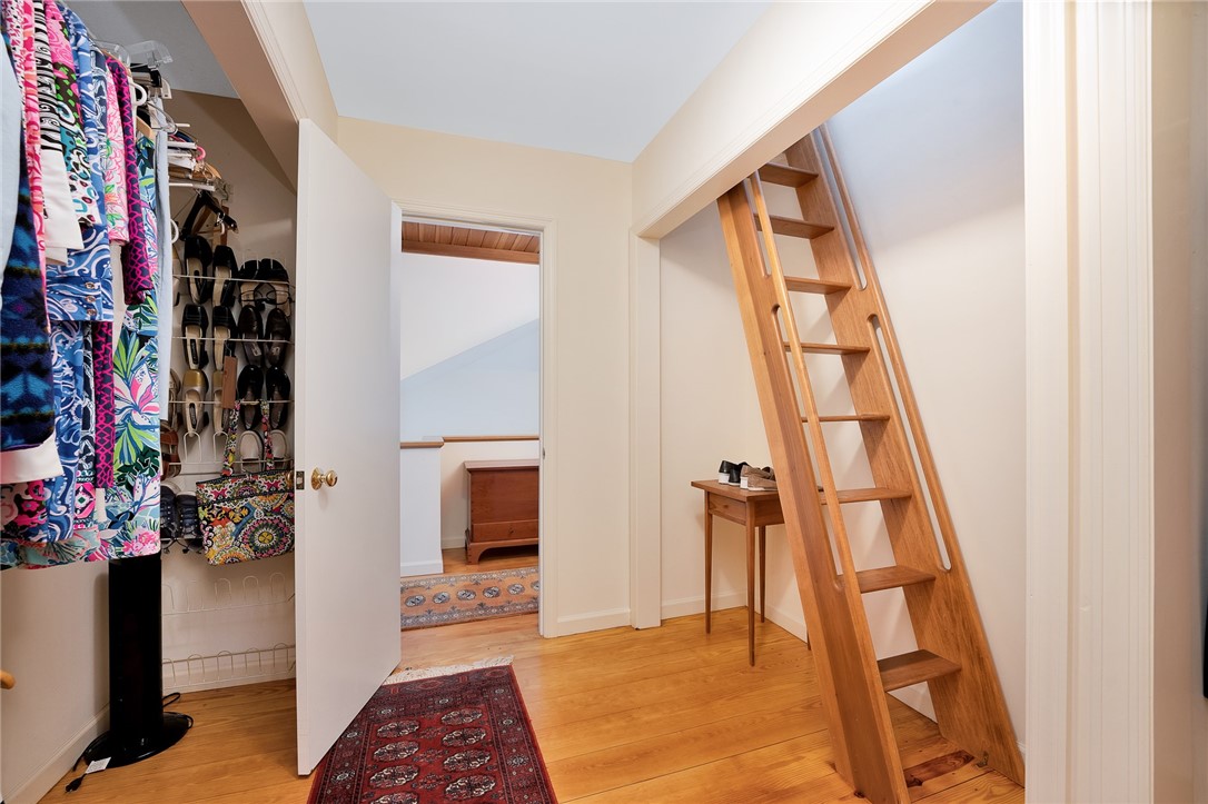 47 South Arnolda Road Charlestown, RI 02813 - Photo 45 of 49 primary walk in closet with ladder to cupola