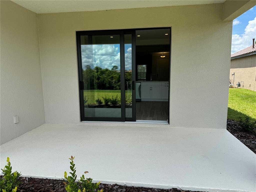 261 Potenza Loop Nokomis, FL 34275 - Photo 19 of 42 a view of an empty room with a window