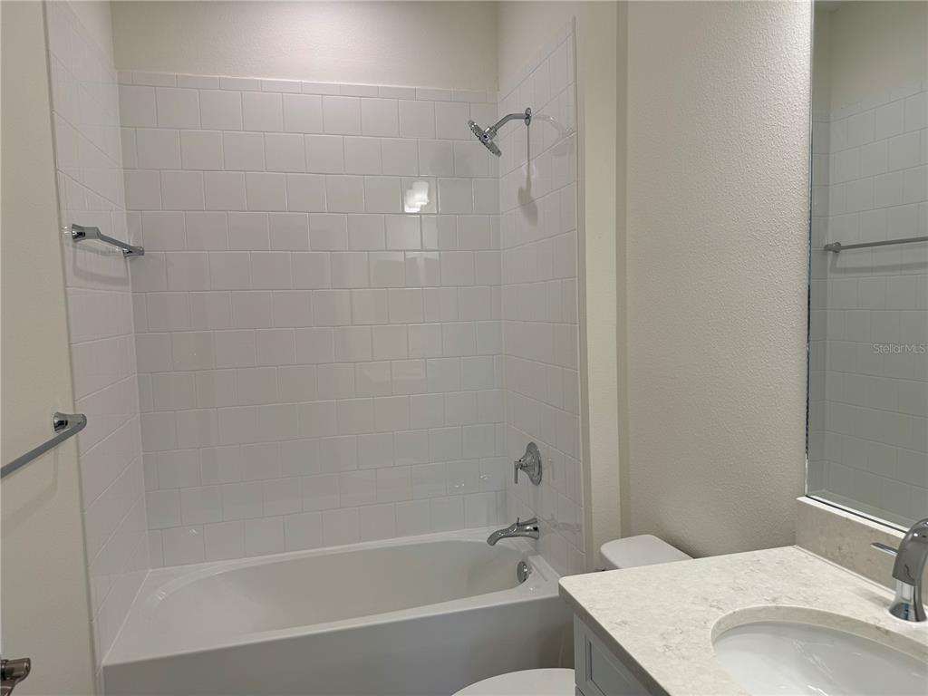 261 Potenza Loop Nokomis, FL 34275 - Photo 21 of 42 a bathroom with a sink and a bathtub