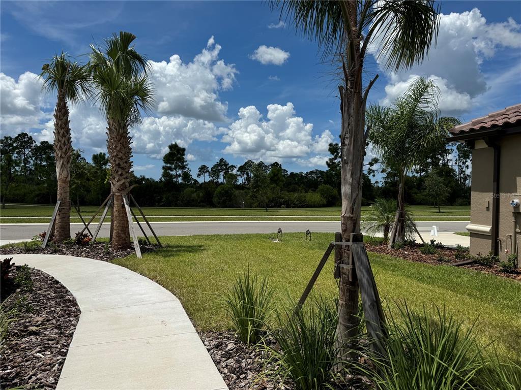 261 Potenza Loop Nokomis, FL 34275 - Photo 28 of 42 a view of a garden with a slide