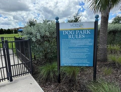 261 Potenza Loop Nokomis, FL 34275 - Photo 32 of 42 a sign on the side of a road