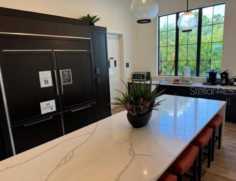 261 Potenza Loop Nokomis, FL 34275 - Photo 36 of 42 a view of a living room and a potted plant