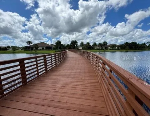a view of wooden floor with a lake