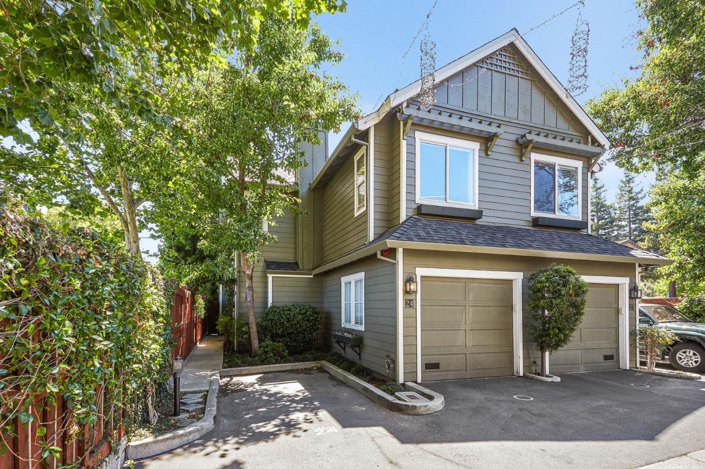 600 Willow Road, Unit 24 Menlo Park, CA 94025 - Photo 1 of 23 a front view of a house with a yard