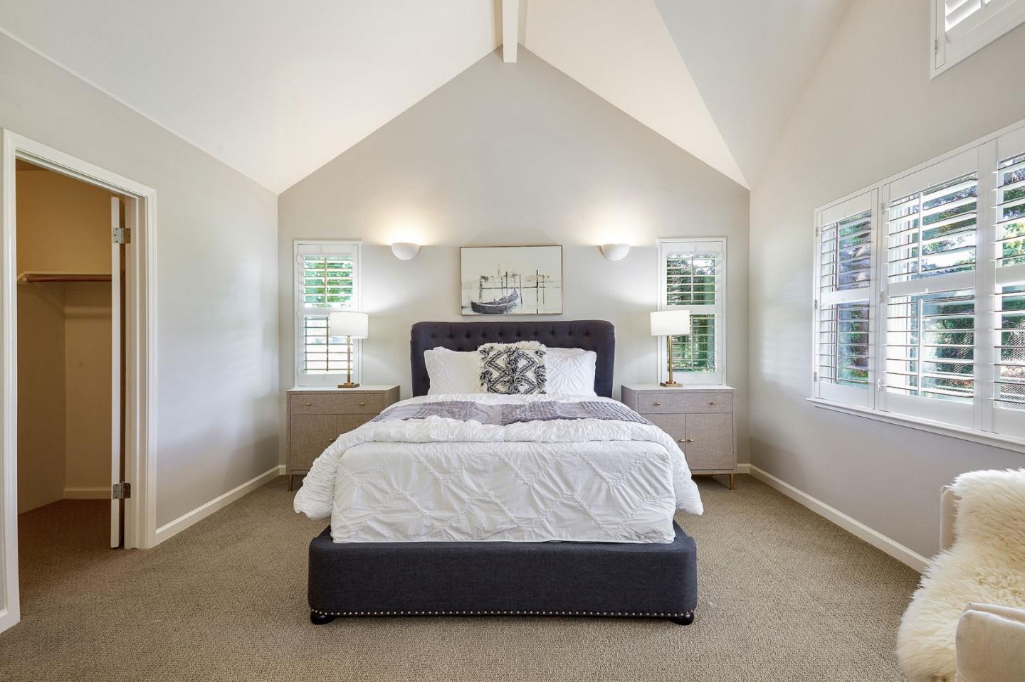 600 Willow Road, Unit 24 Menlo Park, CA 94025 - Photo 15 of 23 a spacious bedroom with a bed and window