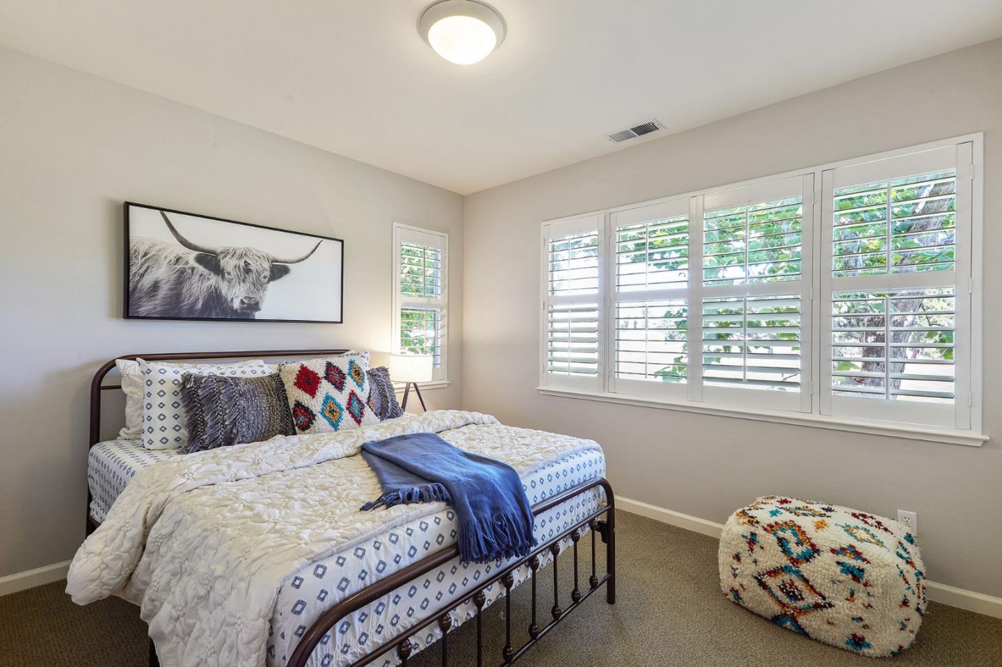 600 Willow Road, Unit 24 Menlo Park, CA 94025 - Photo 18 of 23 a bedroom with a bed and a window