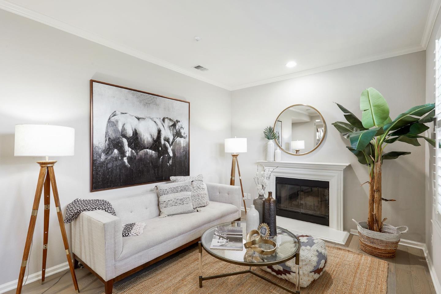 600 Willow Road, Unit 24 Menlo Park, CA 94025 - Photo 5 of 23 a living room with furniture a clock and a fireplace