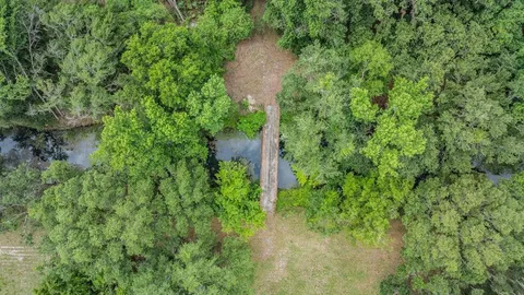 a view of a house with a outdoor space and porch