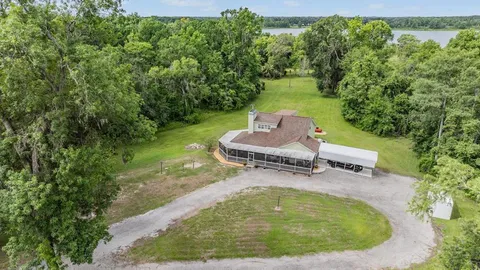 a view of a backyard with a fence