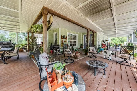 a bathroom with a sink a mirror and a window