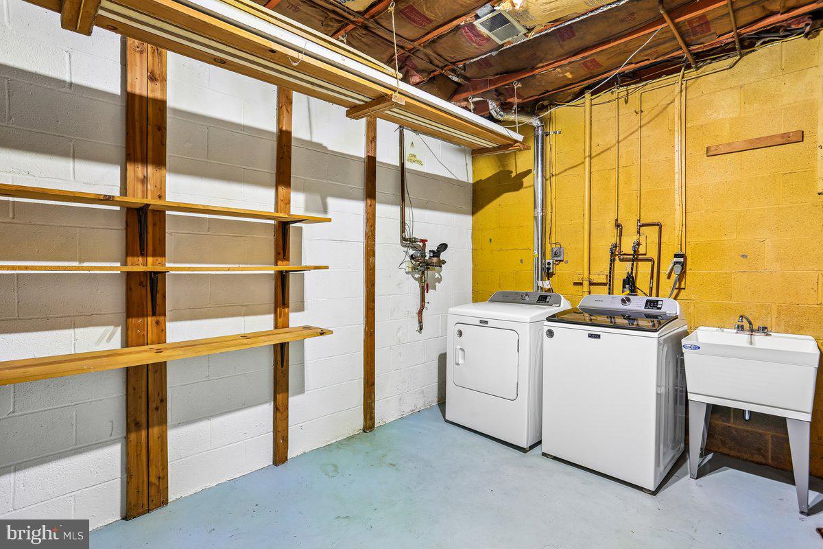 76 Timber Rock Road Gaithersburg, MD 20878 - Photo 41 of 51 a utility room with dryer and washer