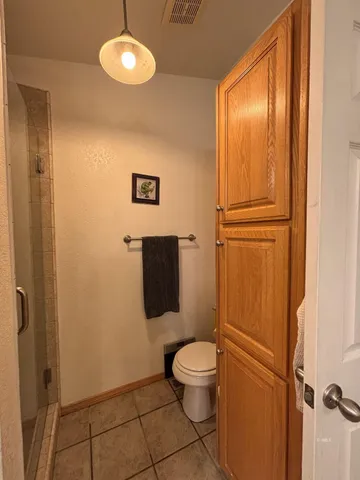 a bathroom with a toilet