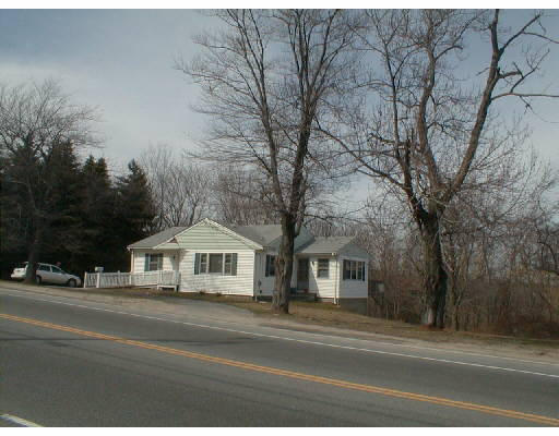 660 Boston Road Billerica, MA 01821 - Photo 1 of 1 a front view of a house with a yard and garage
