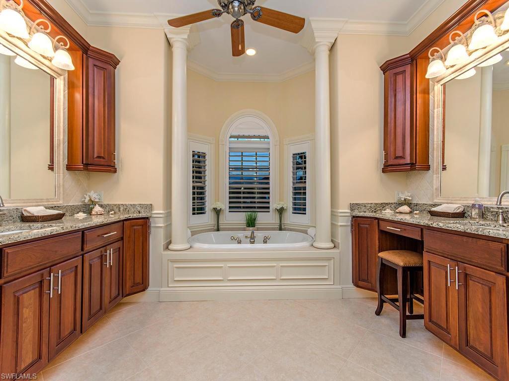 1835 Kingfish Road Naples, FL 34102 - Photo 11 of 23 a bathroom with a sink and a bathtub