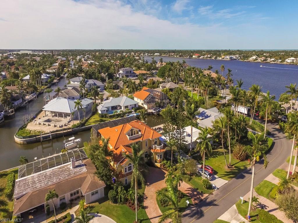 1835 Kingfish Road Naples, FL 34102 - Photo 21 of 23 an aerial view of residential houses with outdoor space