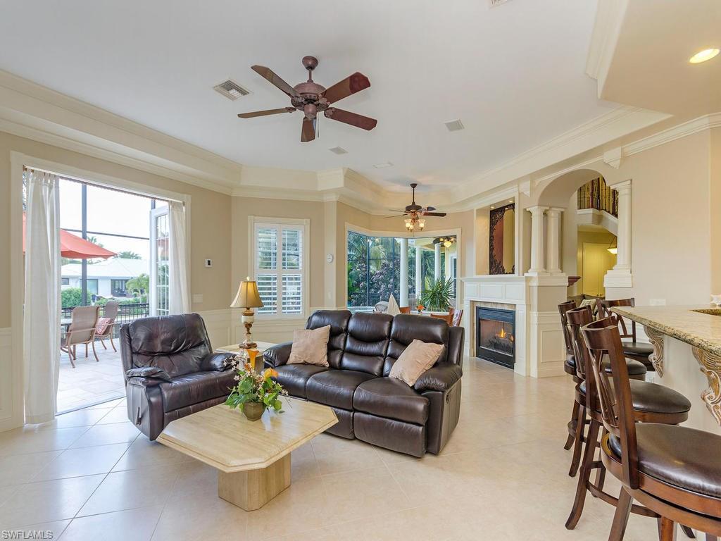 1835 Kingfish Road Naples, FL 34102 - Photo 3 of 23 a living room with furniture