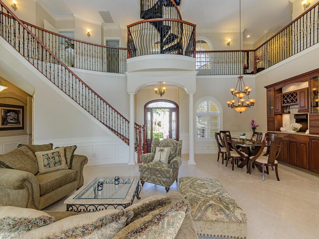 1835 Kingfish Road Naples, FL 34102 - Photo 7 of 23 a living room with furniture