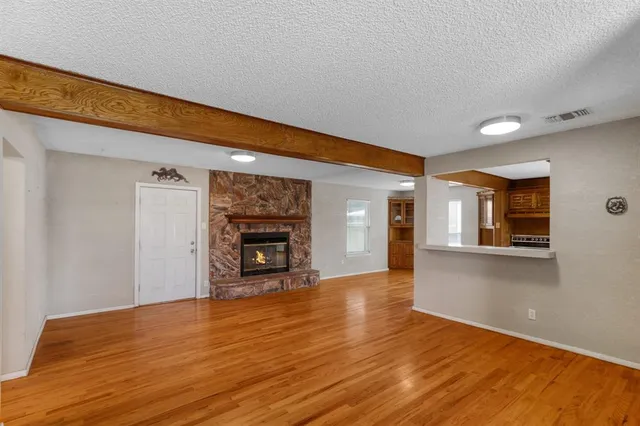a view of a livingroom with a fireplace