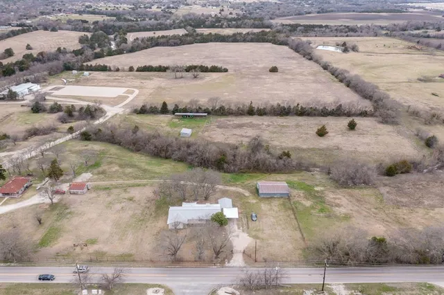 a view of swimming pool with a yard