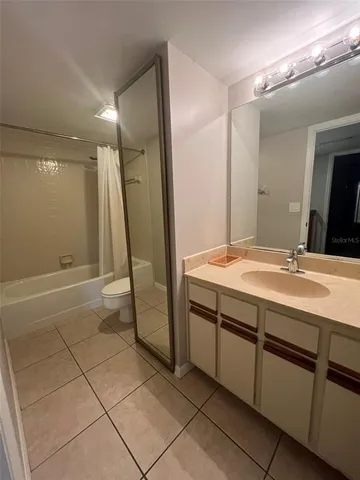 a view of a livingroom with a staircase