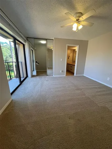 a bathroom with a tub and shower