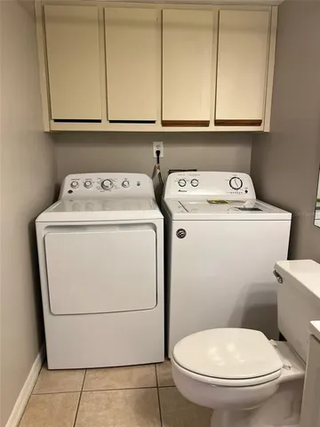 a bathroom with a sink a toilet and vanity