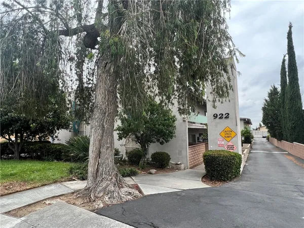 a front view of a house with a garage