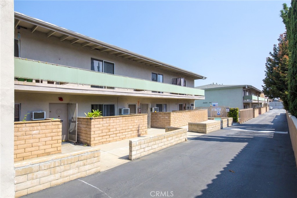 922 West Duarte Road, Unit 3 Arcadia, CA 91007 - Photo 3 of 16 a front view of a house with a garage