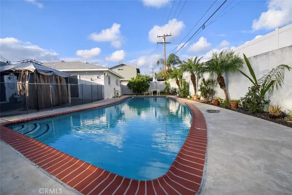 a view of a balcony with swimming pool