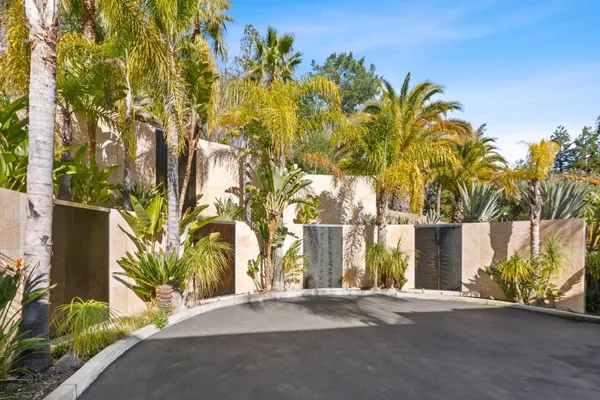 a view of entrance gate of a house