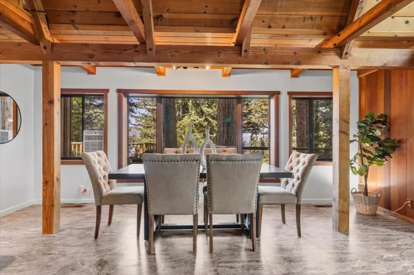a kitchen with stainless steel appliances granite countertop a sink and a stove