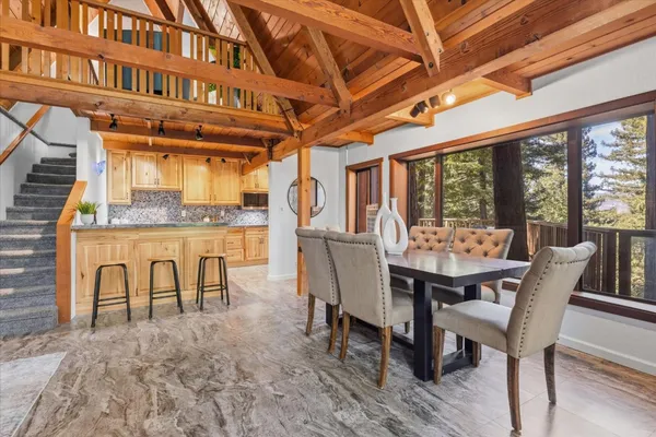 a view of a kitchen cabinets and a wooden floor