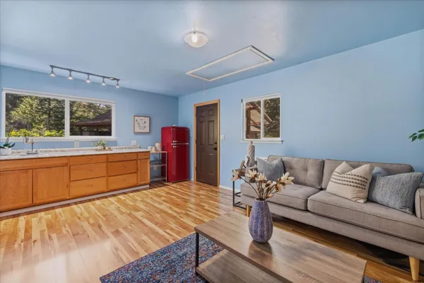 a bedroom with a bed and dresser