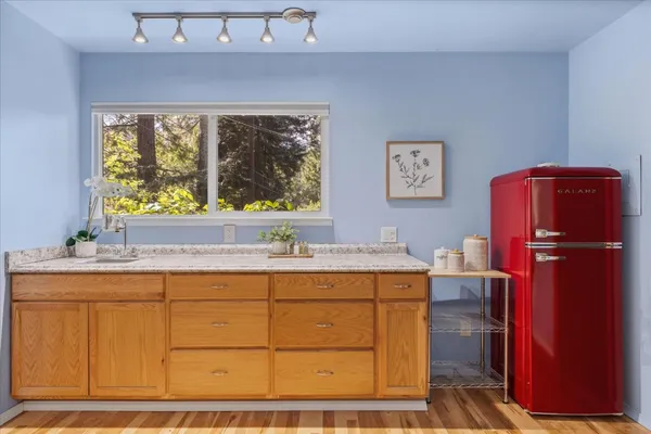 a workspace with furniture and window