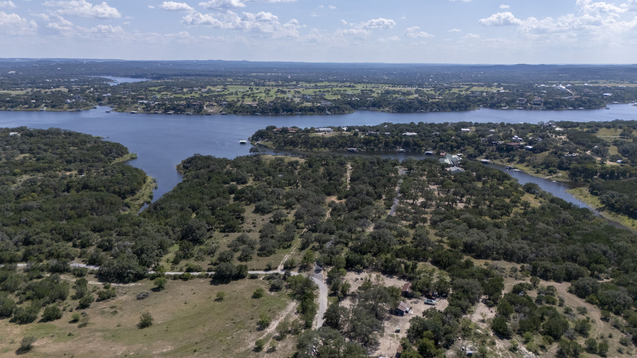 Tbd Singleton Road Marble Falls, TX 78654 - Photo 8 of 40 Paved County Road in the foreground all the way to this property...Bird's eye view of the property, Lake and surrounding area from County Road