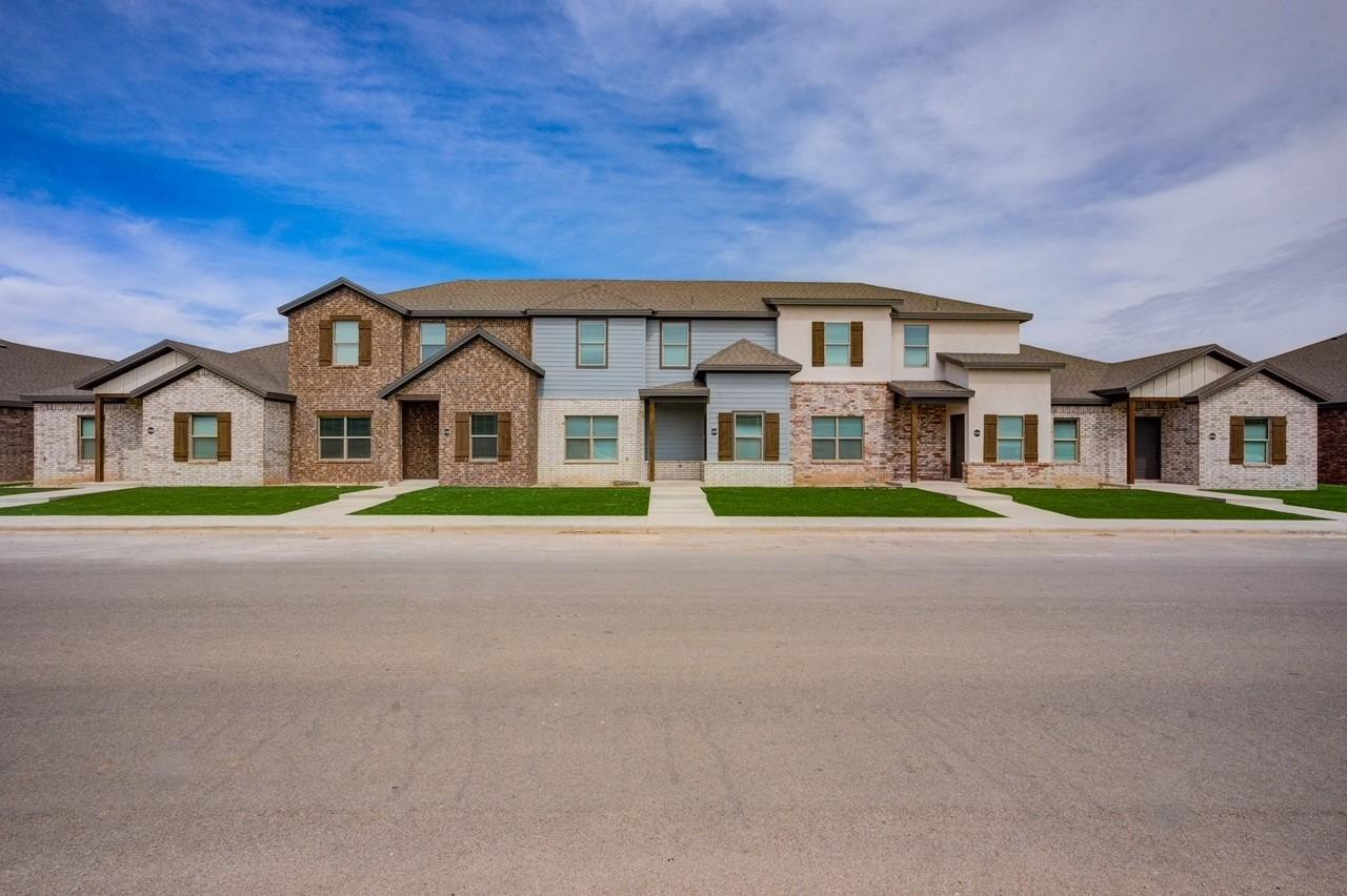 2534 137th Street Lubbock, TX 79423 - Photo 1 of 1 a aerial view of a house with a big yard and large trees