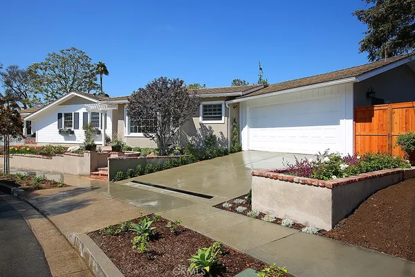 a front view of a house with a porch